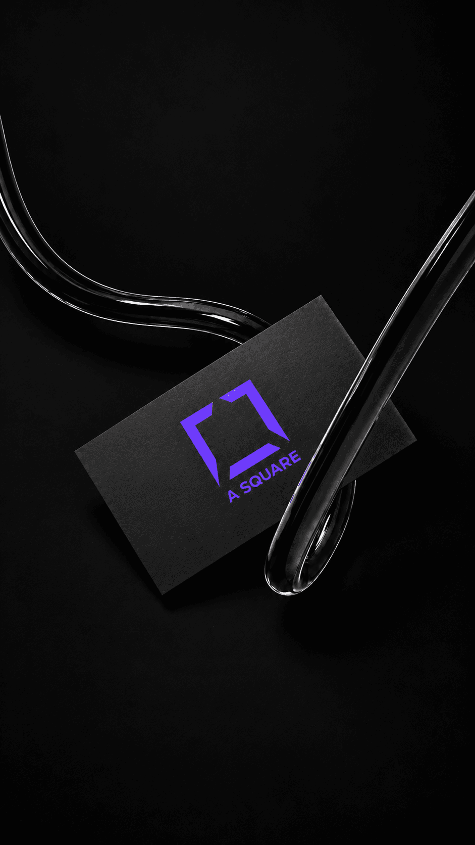 A SQUARE logo card suspended by a glass tube
