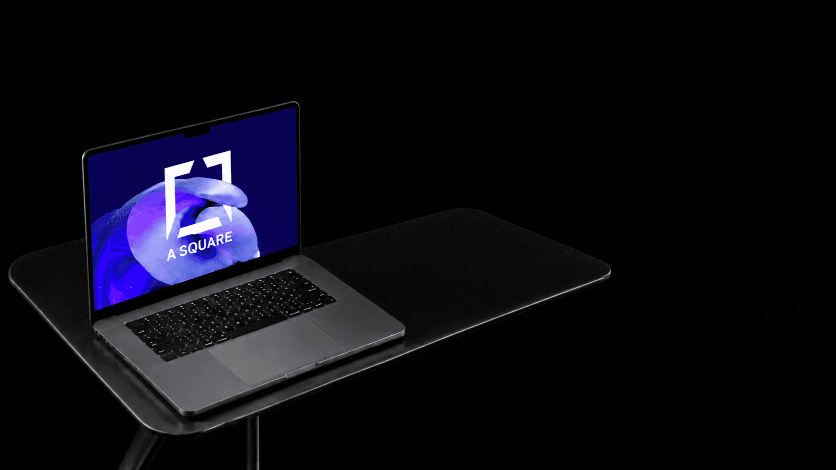 Laptop on a desk during a marketing work session