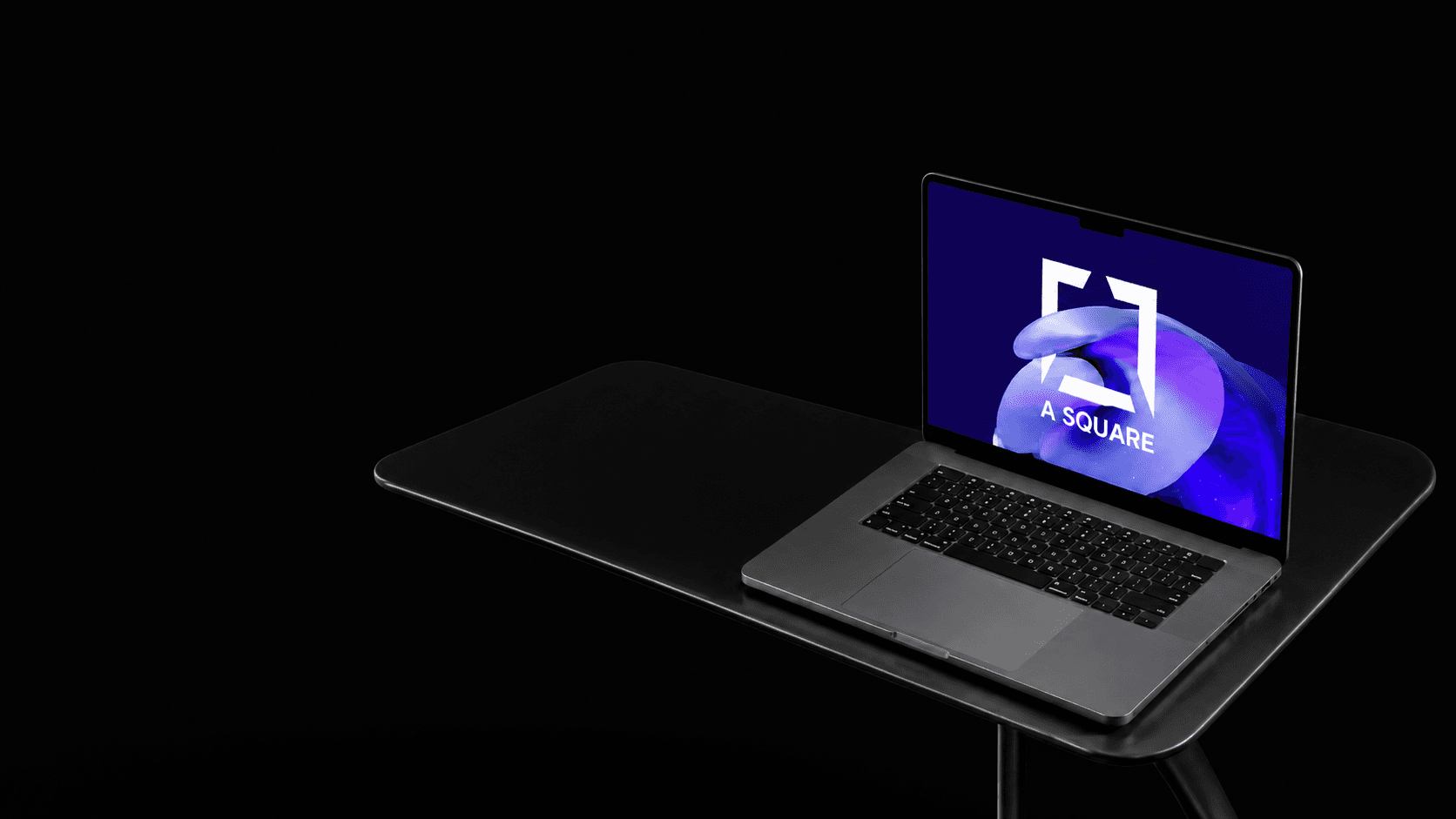 Laptop on a desk during a marketing work session